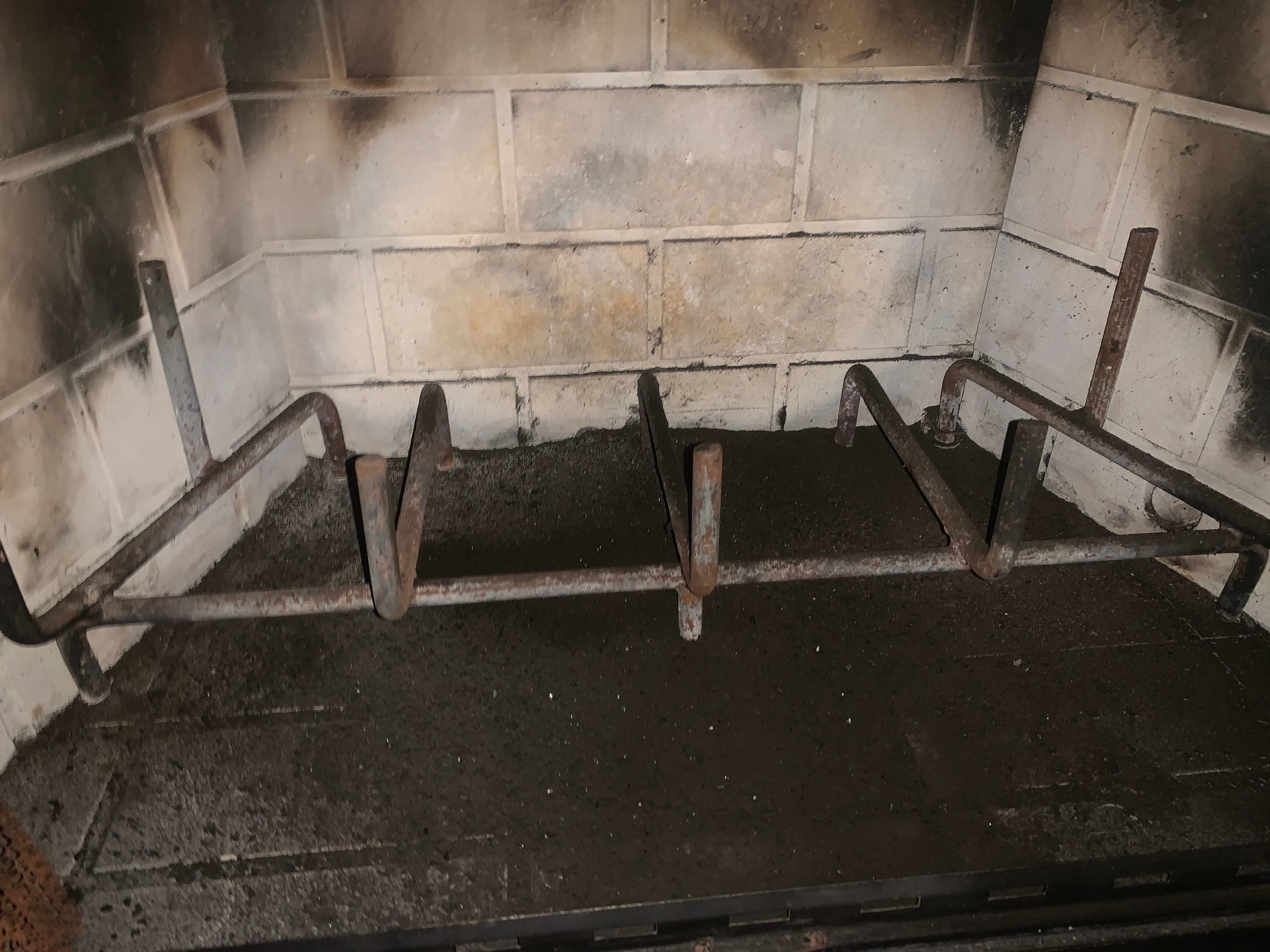 Fireplace with soot from chimney sweep