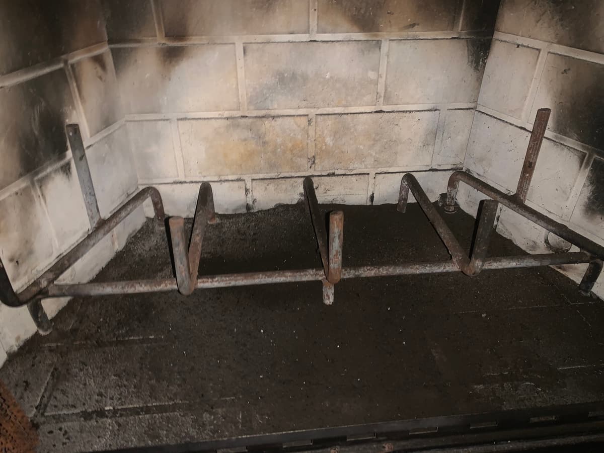 Fireplace with soot from chimney sweep