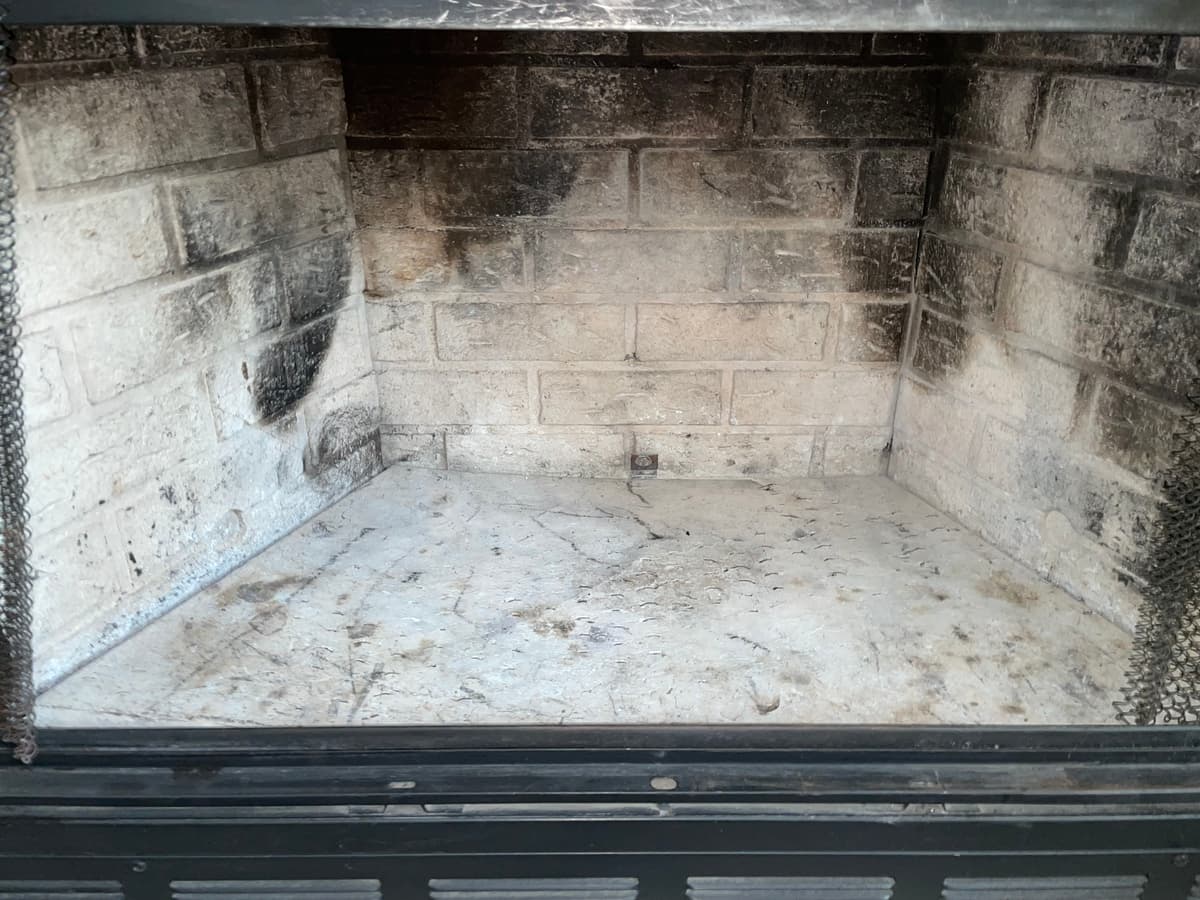 The same brick firebox clean after chimney cleaning
