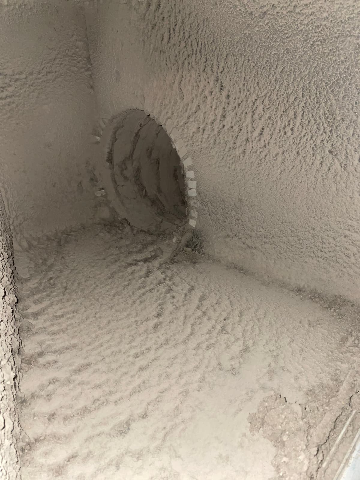 Dusty plenum before hvac cleaning