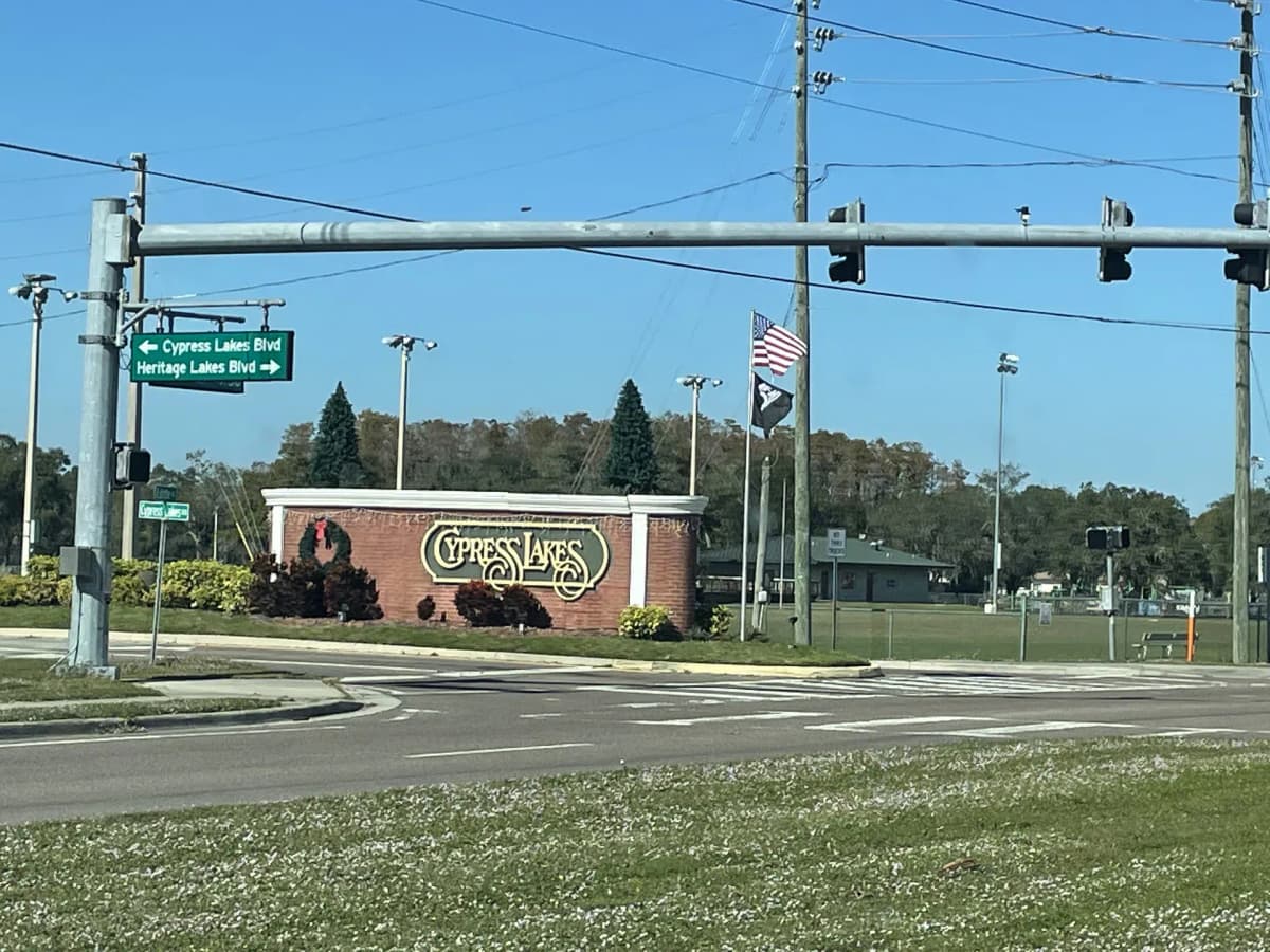 The brick entrance sign of a Central Florida managed community, one of the HOA and multi-building clients we cover