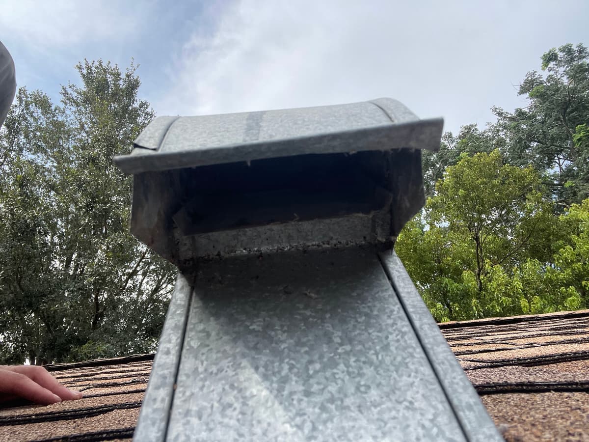 The same roof vent cap clear and venting freely after cleaning