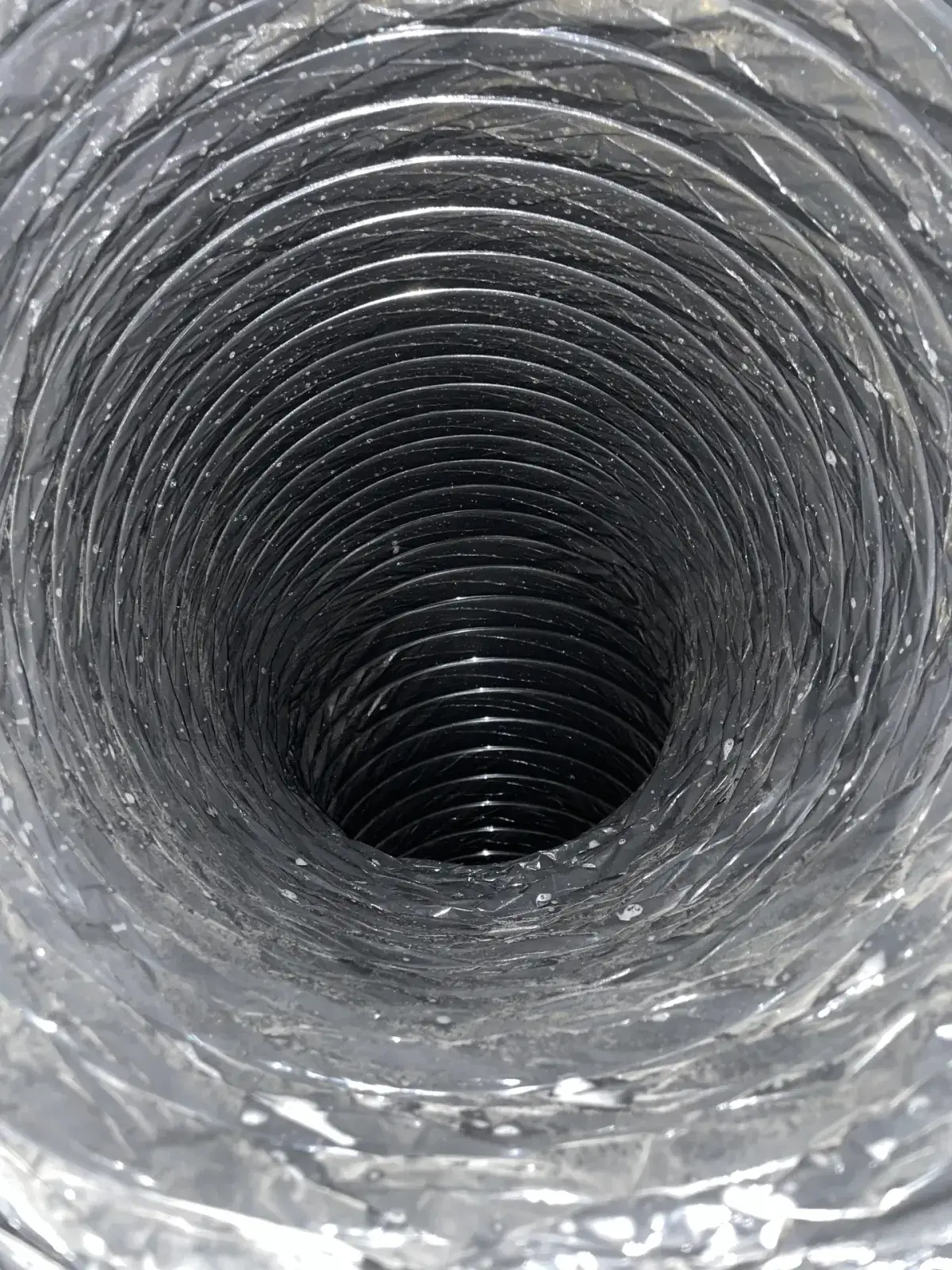 A smooth, clean duct liner after cleaning