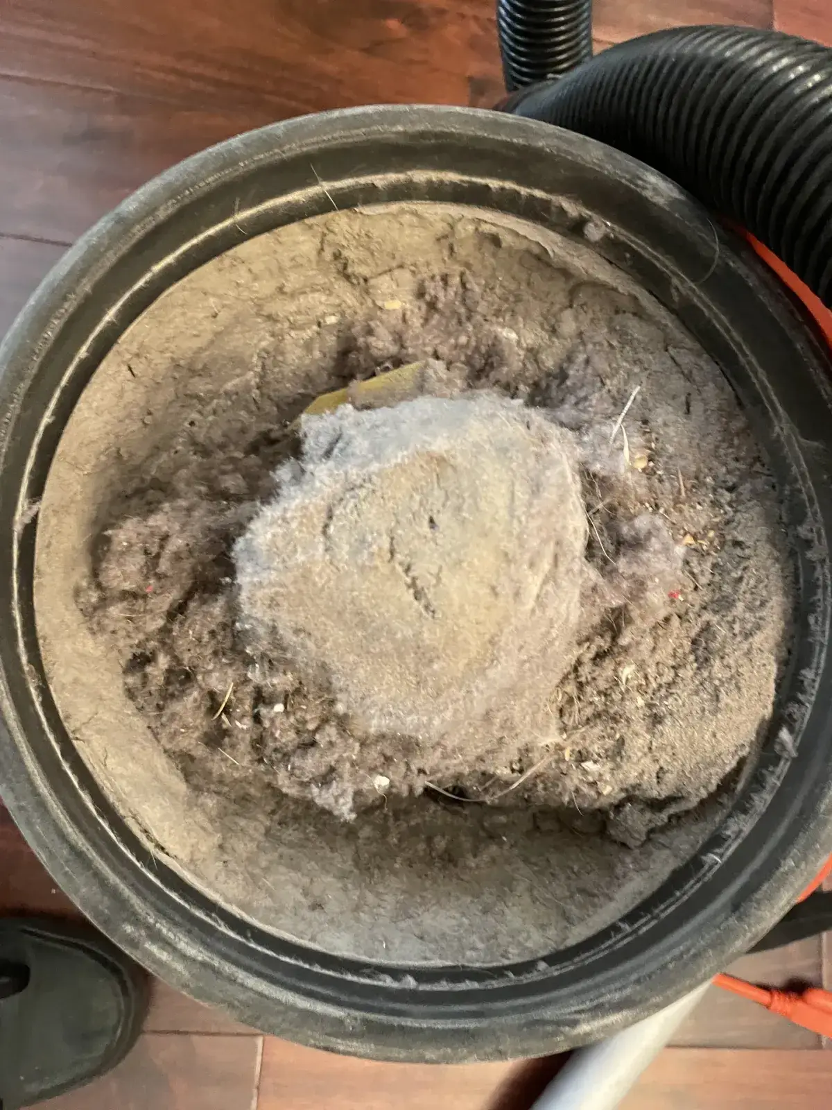 Lint packed around the inside of a dryer duct