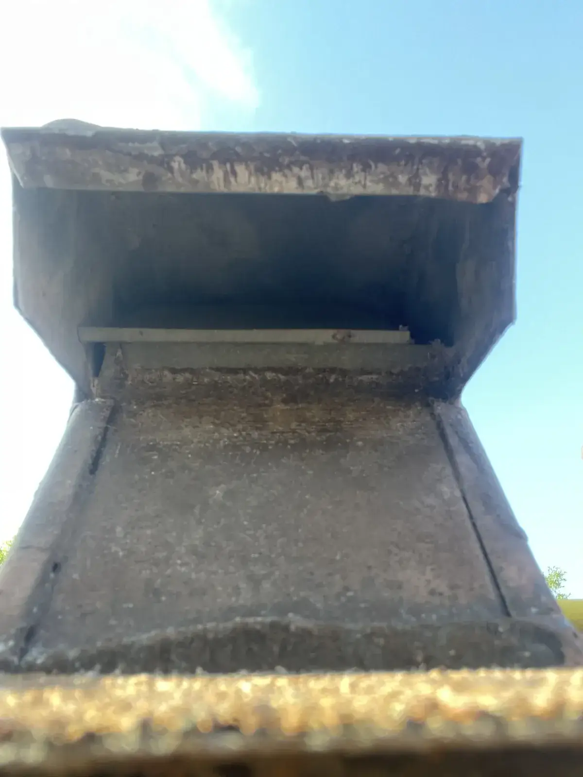 A roof dryer vent hood after cleaning