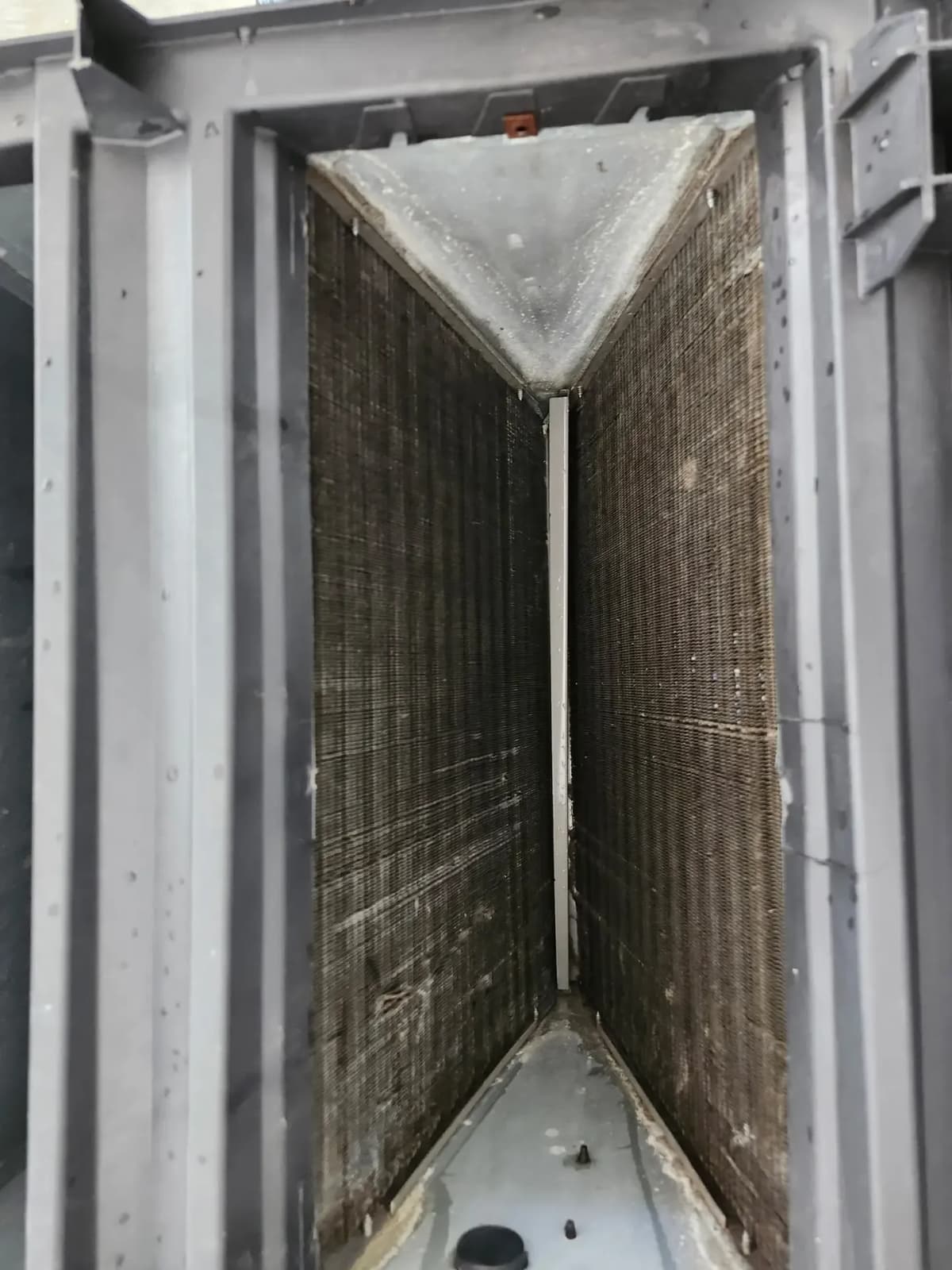 The same evaporator coil after cleaning, fins clear