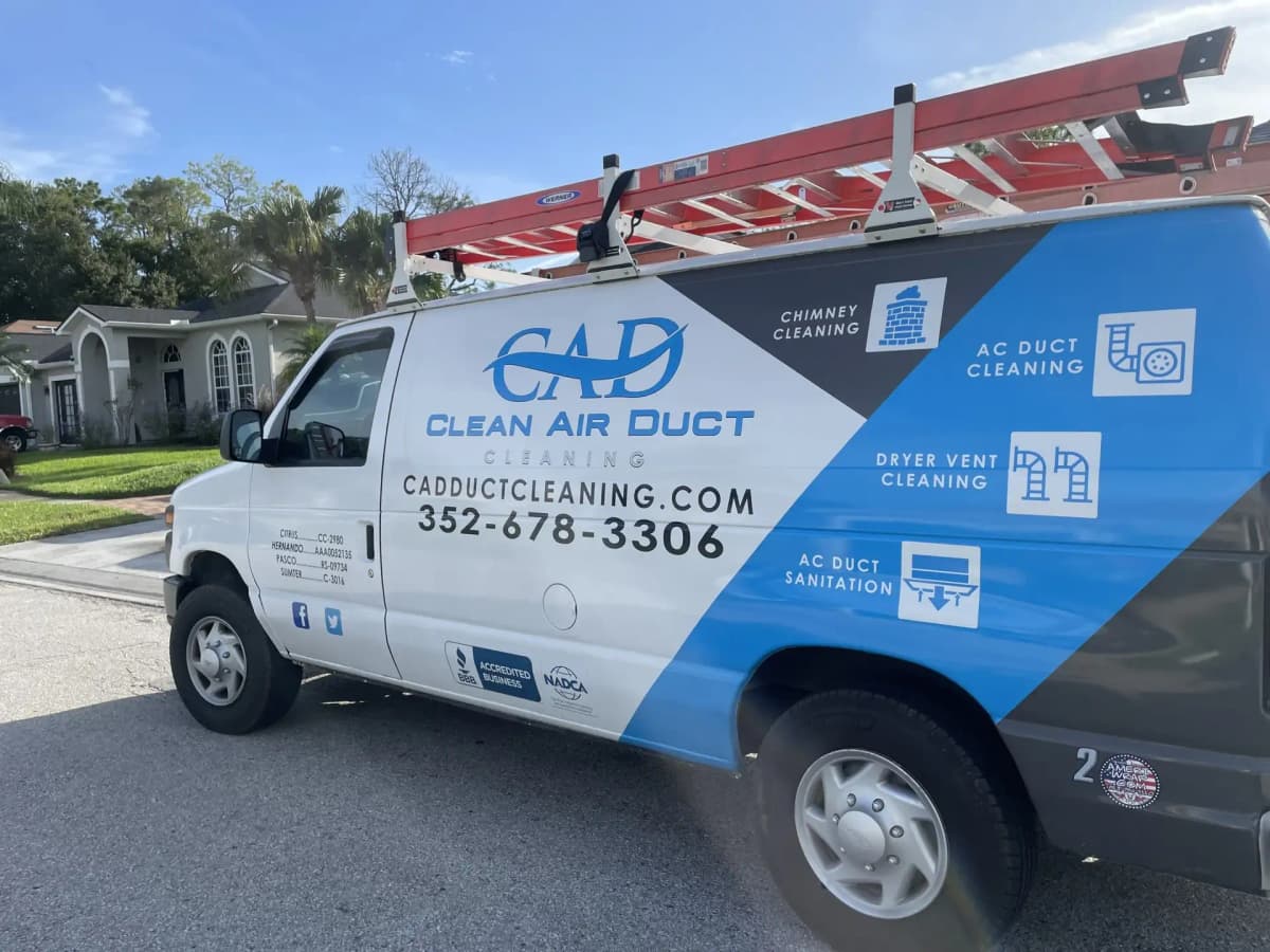 Clean Air Duct Cleaning van on a residential driveway in Central Florida