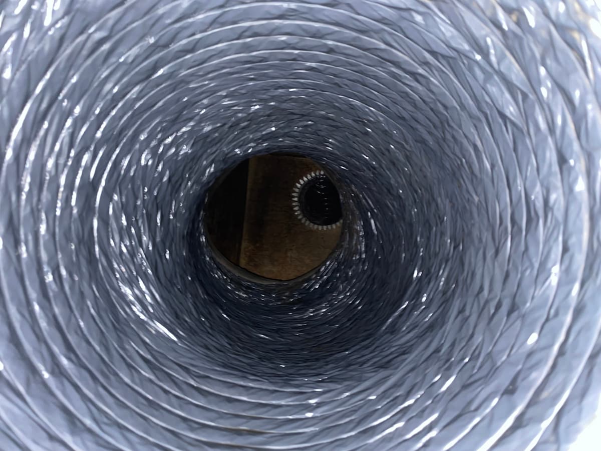 The same duct after cleaning, with the liner clean