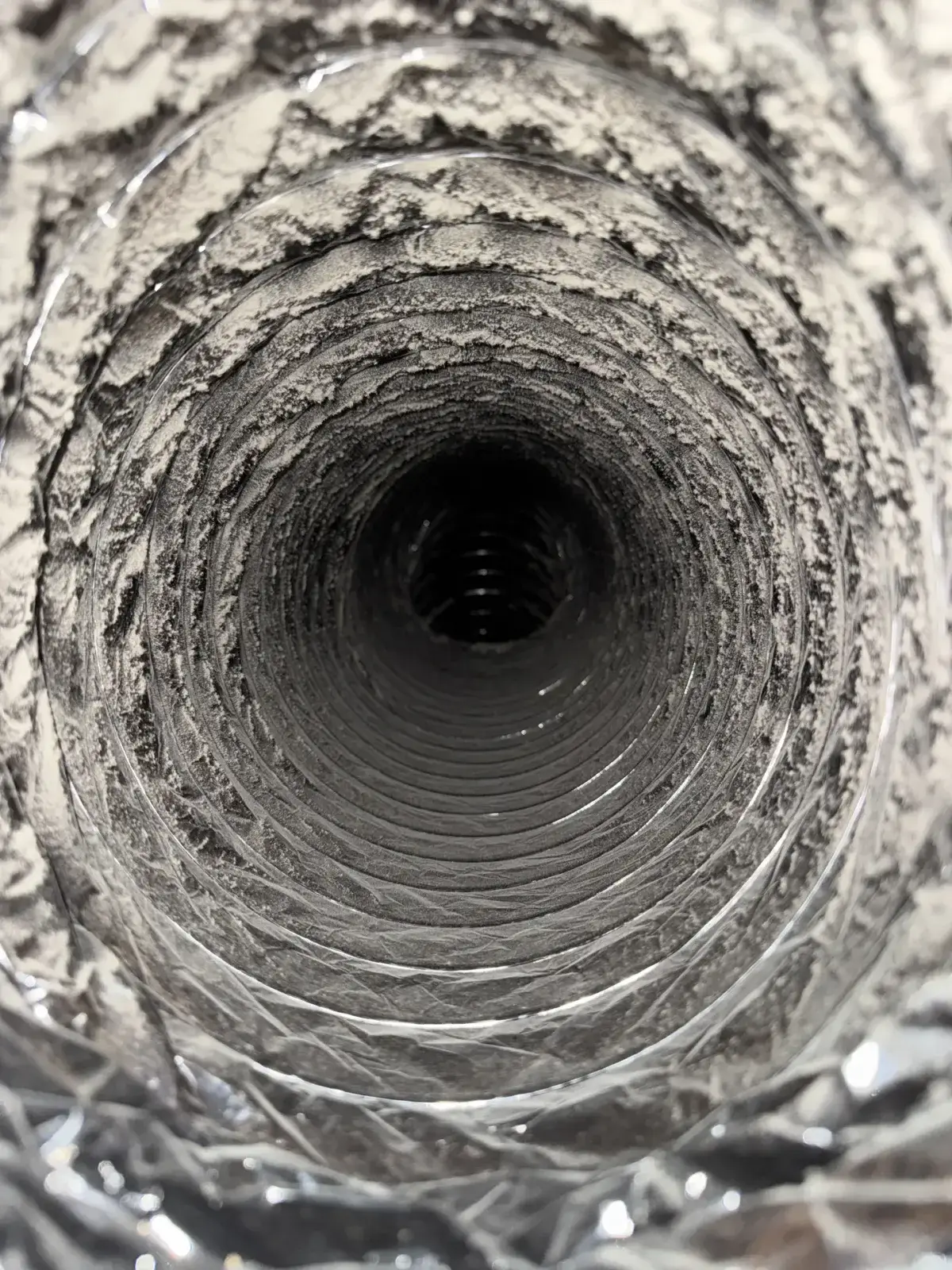 Dust gathered inside a narrow duct run
