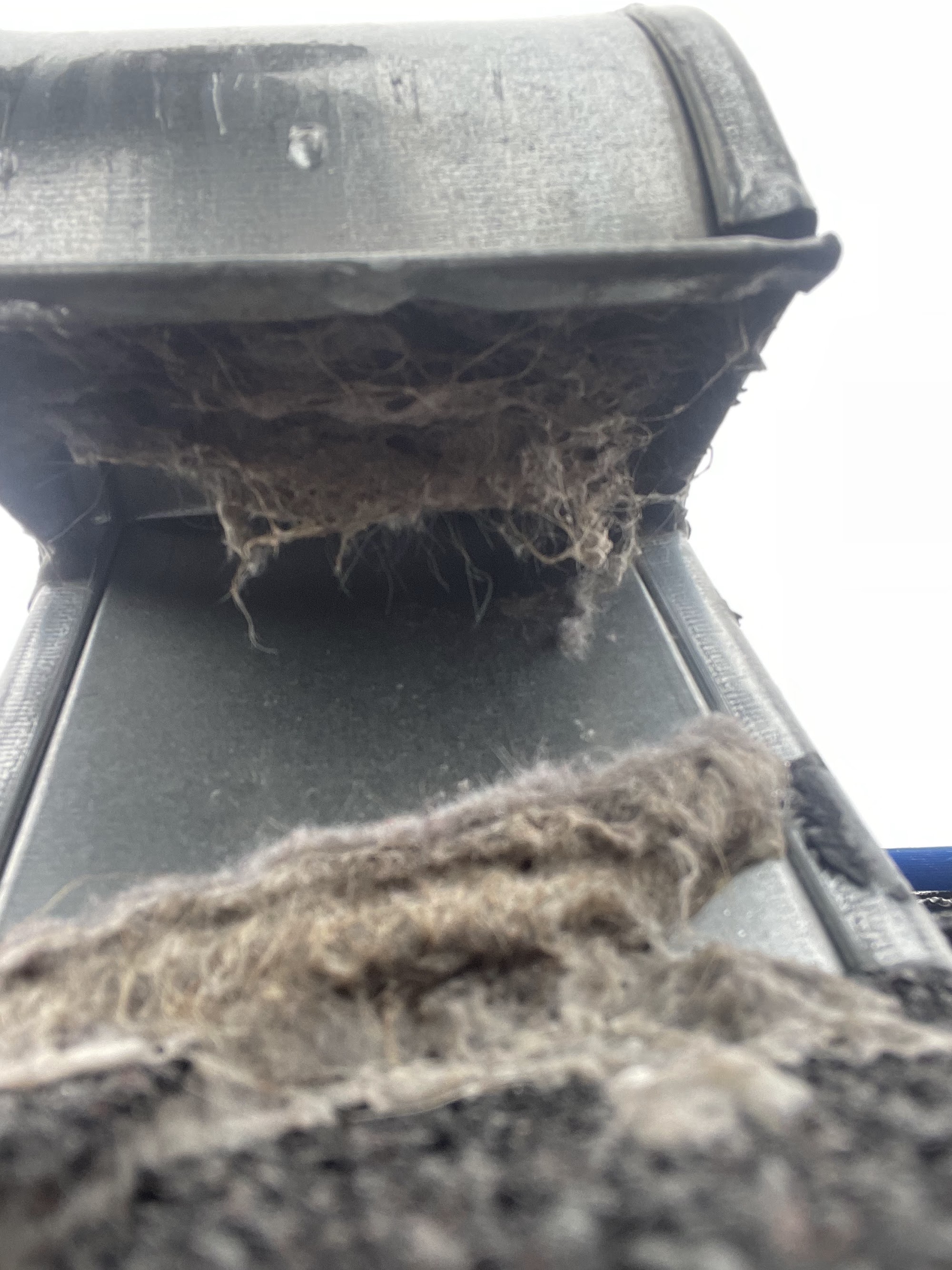 Lint built up inside a dryer vent duct run
